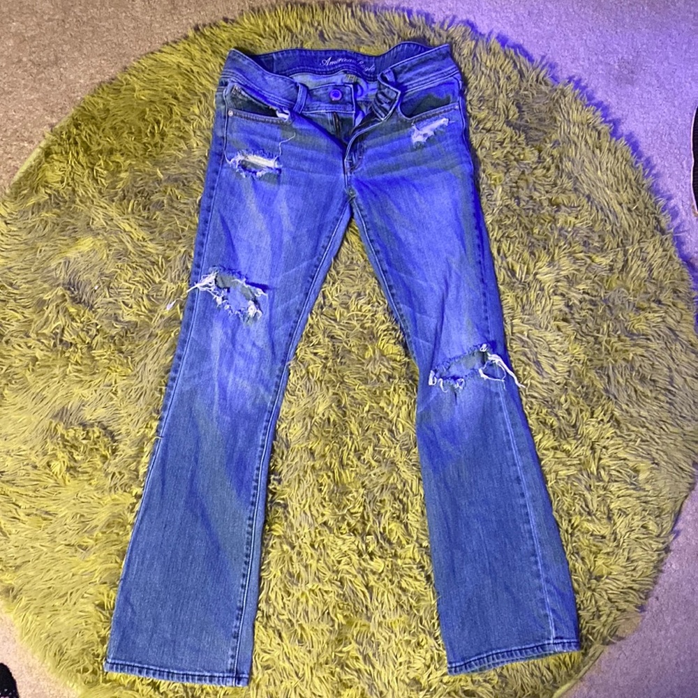 low rise distressed bellbottom jeans
